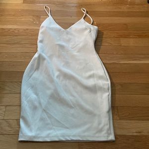 White mini dress with pretty silver across the back ..